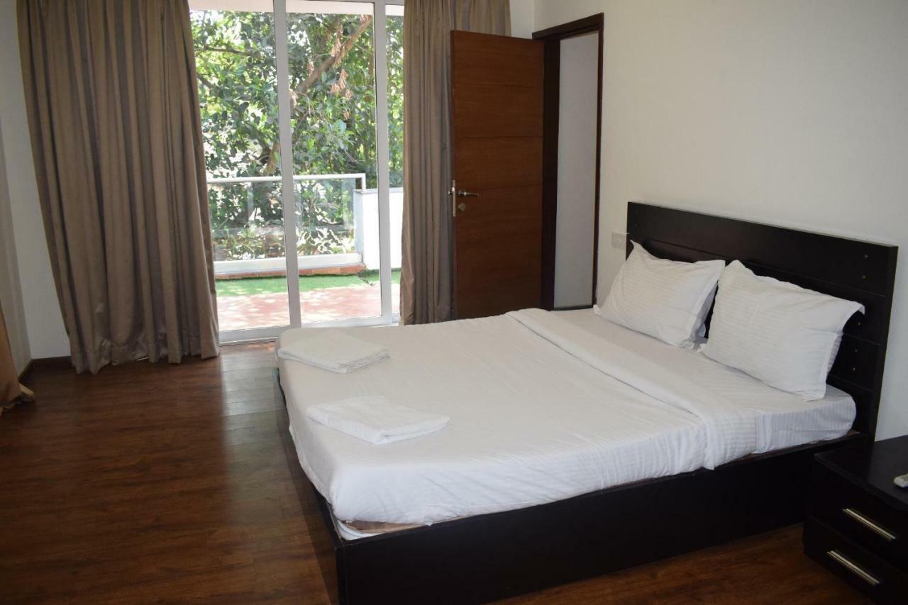 Aarju Luxurious Wave Apartment กาลังกูติ ภายนอก รูปภาพ